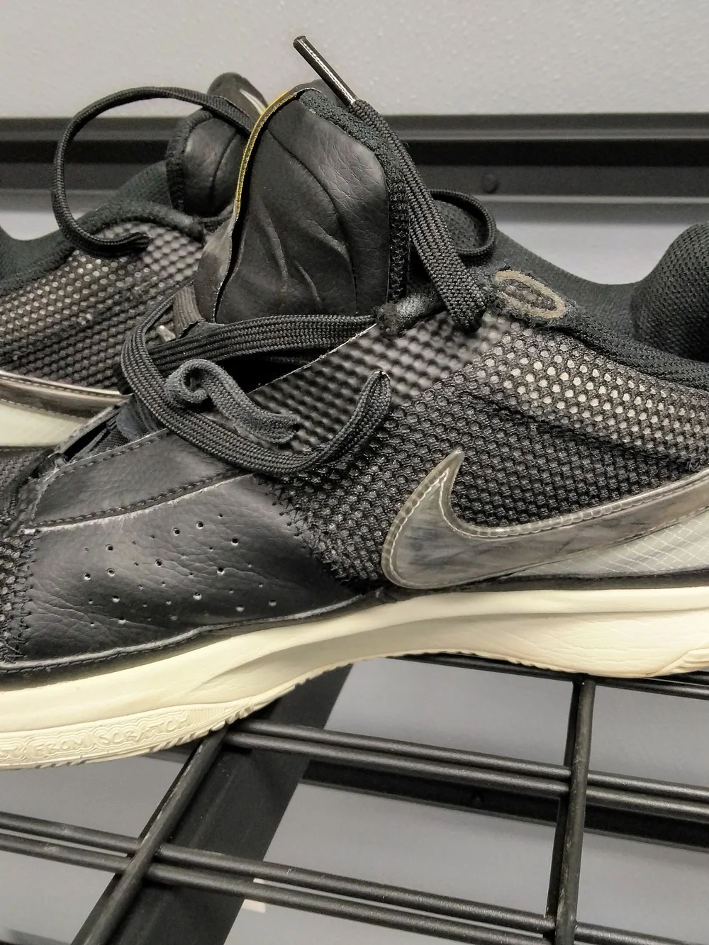 Nike Men’s Black Athletic Sneakers with Yellow Accent